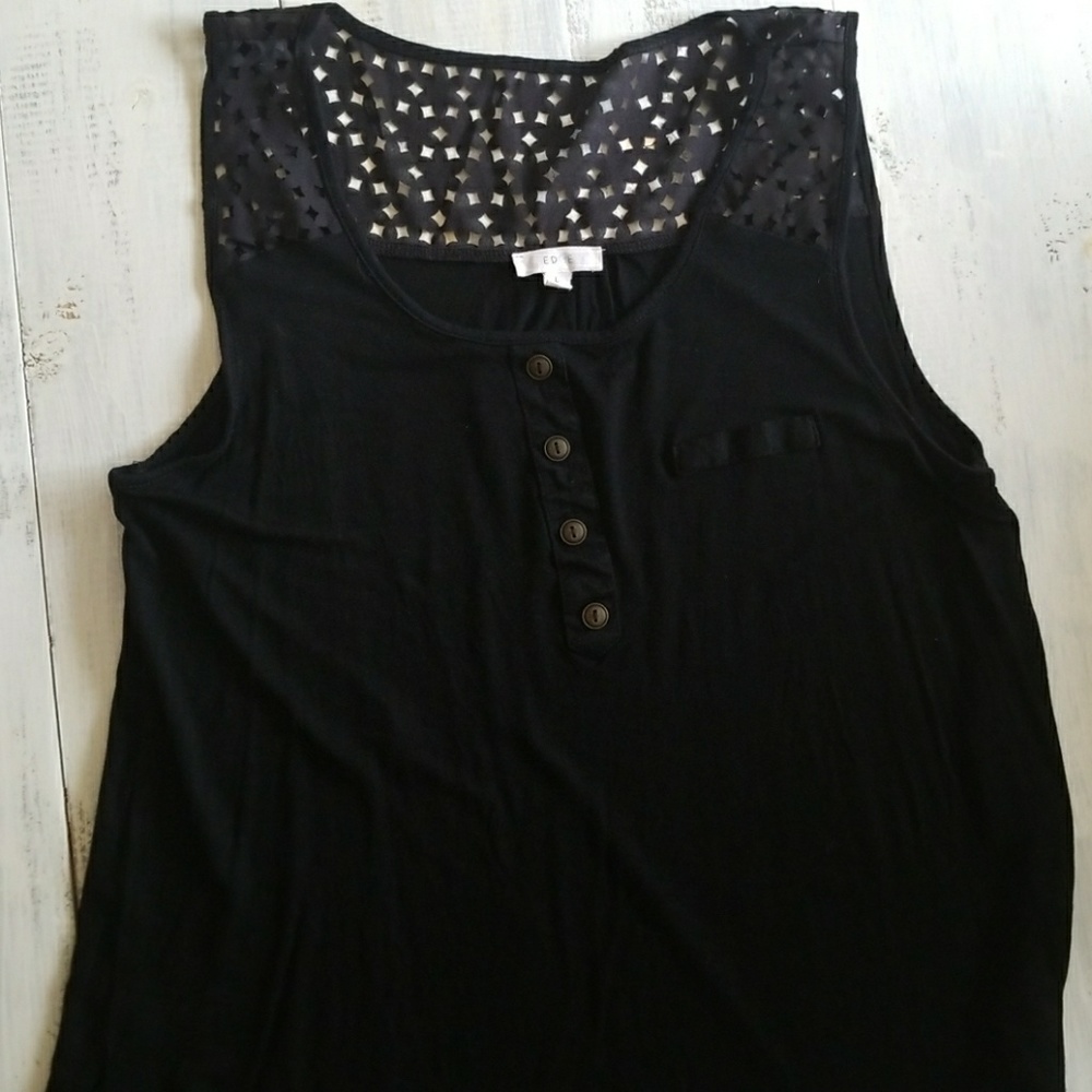 Black sleeveless top with laser cut detail